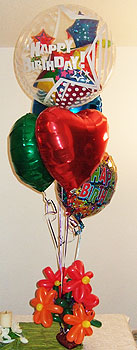 Geburtstags Geschenk mit verschiedenen Folien-Ballons